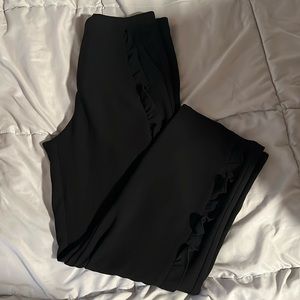 Shinestar black dress pants with ruffle detailing, size M